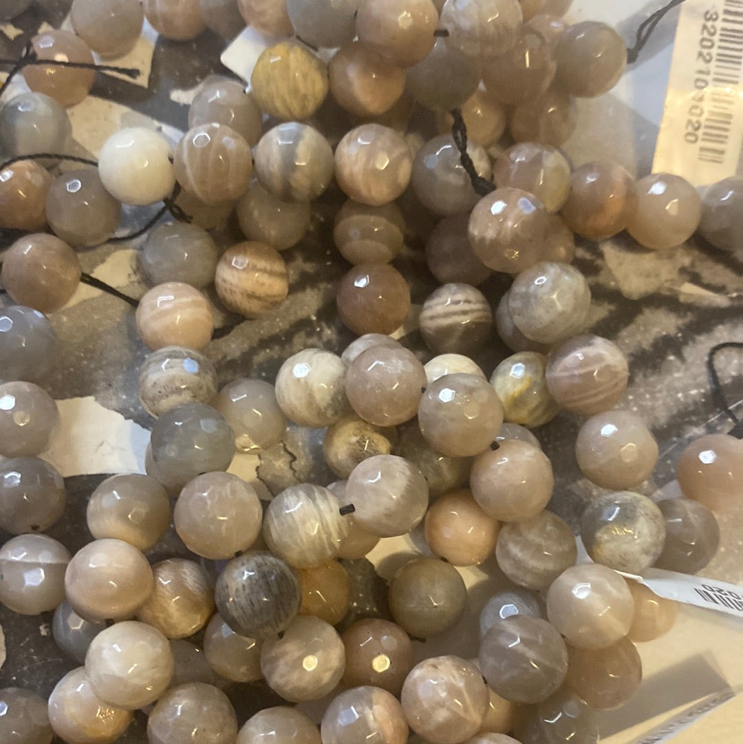 Faceted Black sun stone10mm