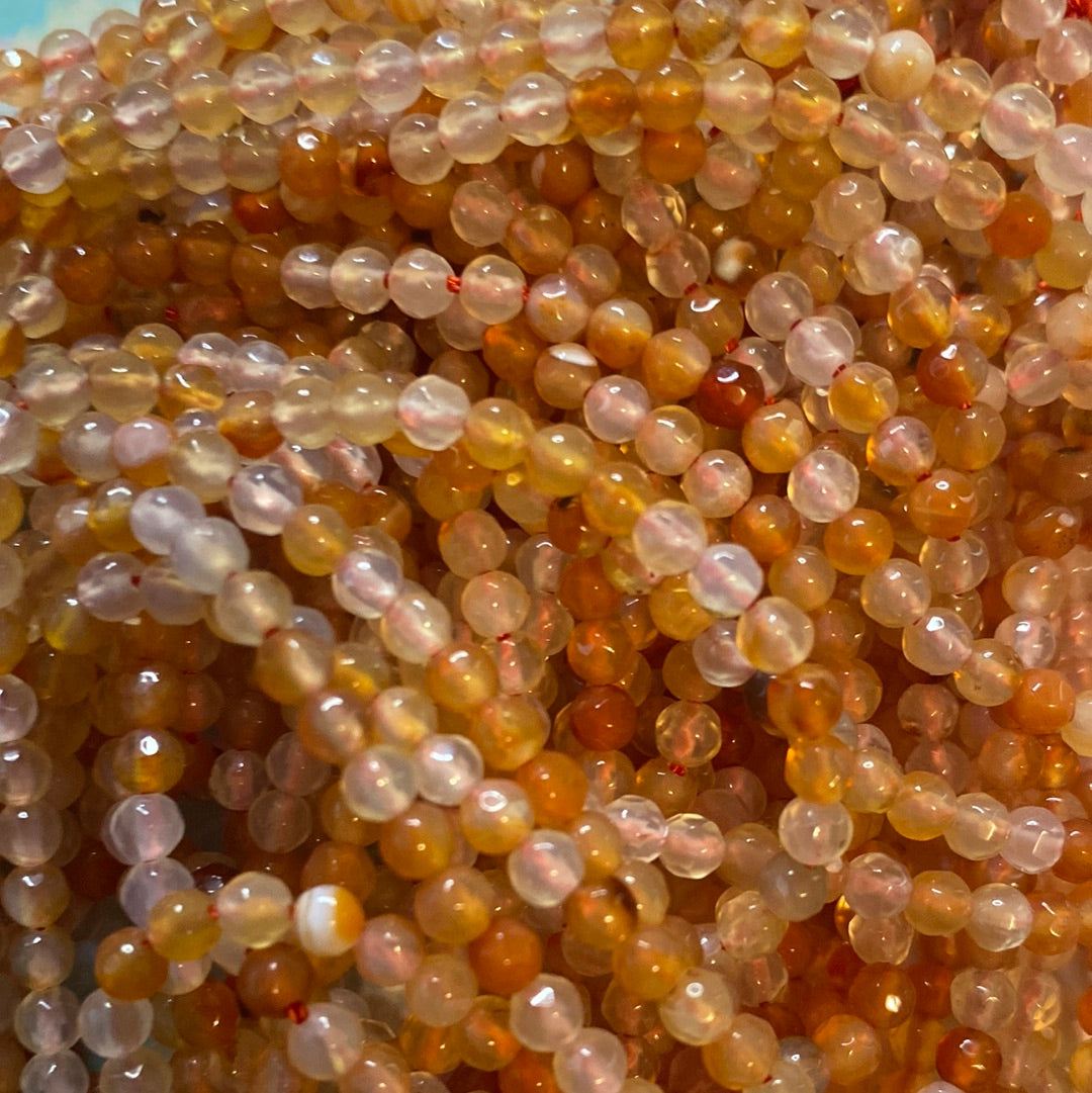 Orange jadeseed beads