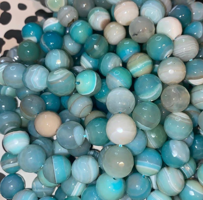 Light blue white in green crystal beads