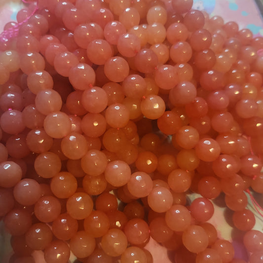 Faceted jade peach beads
