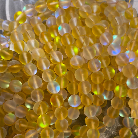 Yellow flash glass beads