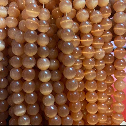 Peach orange cat eye beads