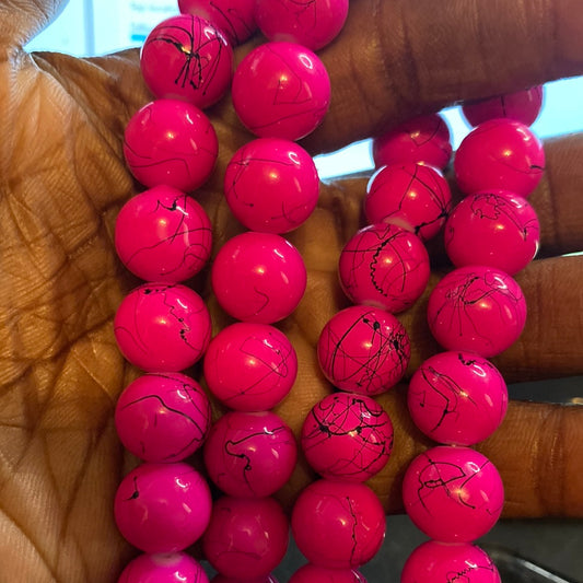 Dark pink in black beads