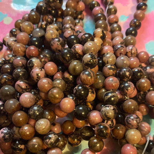 Pink in black  Rhodonite beads