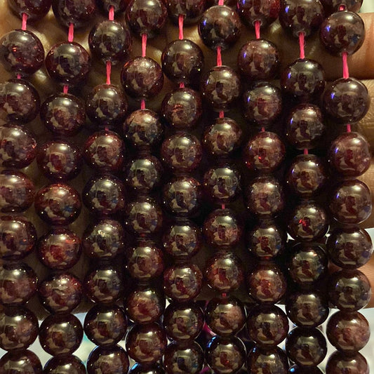Dark purple brown Almandine Garnet