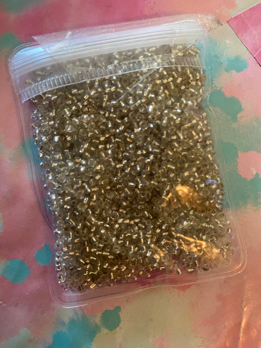 Clear gold seed beads