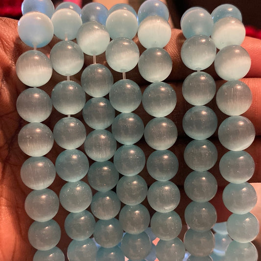 Teal cat eye beads