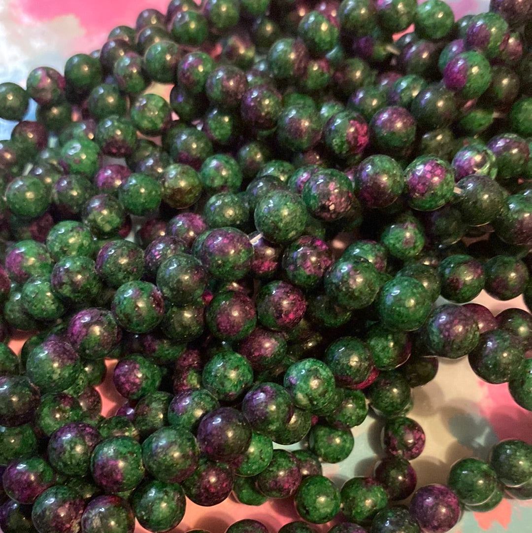 Pink in green jade