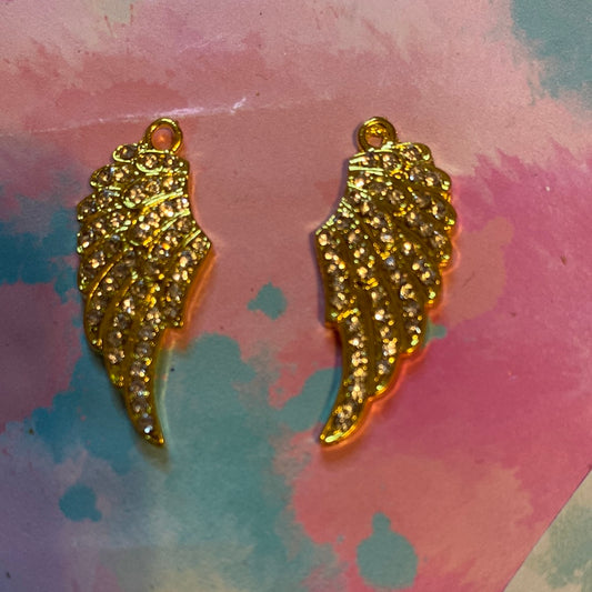 Gold wing charm