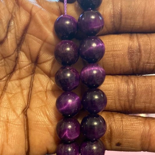 dark purple tiger, eyes beads