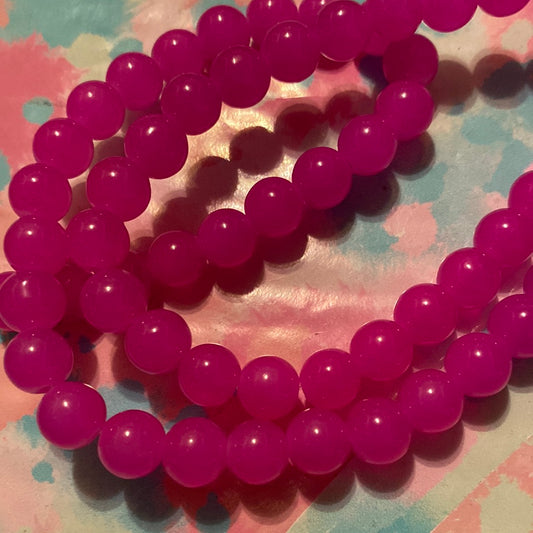 Hot pink glass beads